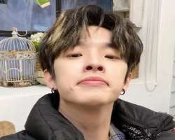 He has piercings in both of his ears.